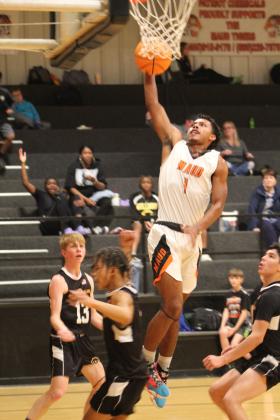Maud's Vcake Wassana-Street goes to the hoop during the second quarter of the home game against Calvin on Jan. 12. The Maud Tigers won 63-48, and their record is 13-2.  Countywide &amp; Sun/Natasha Dunagan