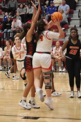 Dale's Karsen Griggs goes to the bucket and adds two points during the fourth quarter of the homecoming game with Wewoka on Jan. 13. The Lady Pirates won, 68-37, and have a record of 15-1. Countywide &amp; Sun/Natasha Dunagan