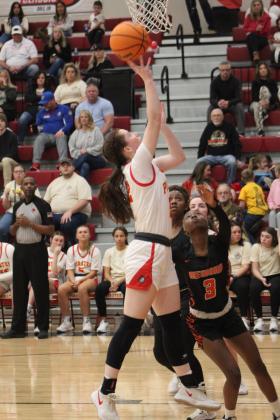 Dale's Brook Rutland makes a basket during the third quarter of the homecoming game against Wewoka on Jan. 13. The Lady Pirates won, 68-37, and have a record of 15-1. Countywide &amp; Sun/Natasha Dunagan