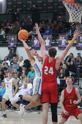 Bethel's Bray Bussell tries to get around Dale's Troy Chambers for two points, as Bethel's R.J. Morris and Dale's Easton Edmonson look on, during the Bethel home game, held at OBU on Jan. 17. Dale won 87-53. Countywide &amp; Sun/Natasha Dunagan