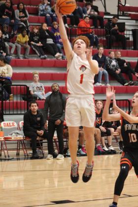 Dale's Easton Edmonson adds two points in the first quarter of the homecoming game against Wewoka on Jan. 13. The Pirates won 85-25 and have a record of 19-0. Countywide &amp; Sun/Natasha Dunagan