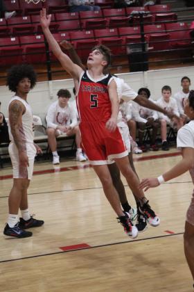 Earlsboro's Brayden  Rawls makes his basket in the game with Wynnewood, Jan. 5, during the Jim Walling Classic. The Wildcats lost this game, 46-51, but won their next two games with Olive, 63-46, and Wilson (Henryetta), 67-46, to become the Consolation Champions. Countywide &amp; Sun/Natasha Dunagan