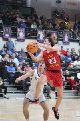 Dale's Deken Jones goes up for the basket, as Bethel's R.J. Morris looks on, during the Bethel home game, held at OBU on Jan. 17. Dale won 87-53. Countywide &amp; Sun/Natasha Dunagan