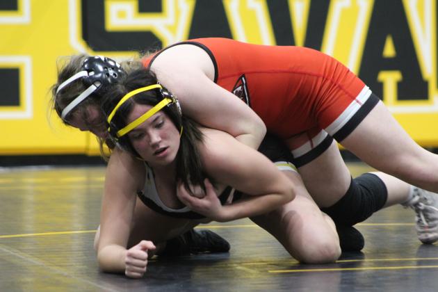 Tecumseh's Jailyn Carpenter tries to release the grip of McLoud's Kaylee Campbell during the homecoming dual meet on Jan. 10 at the Tecumseh Middle School Gym. McLoud's Lady Redskins won 48-24, and the Redskins won 38-33. Countywide &amp; Sun/Natasha Dunagan