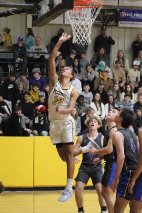 Tecumseh's Marquan Krush puts up a bucket in the third quarter of the homecoming game against Bethel on Feb. 3. The Savages lost, 61-70. Countywide &amp; Sun/Natasha Dunagan