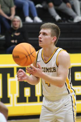 Tecumseh senior Brady Overstreet spins the ball before making a free throw in the fourth quarter of the Class 4A District game against Crossings Christian on Feb. 17. The Savages lost 67-84. Countywide &amp; Sun/Natasha Dunagan