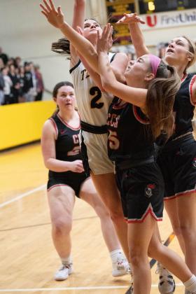 Tecumseh junior Chloe Stephenson tries for two points during the Class 4A District game against Crossings Christian on Feb. 17. The Lady Savages won, 79-26, to become district champions. Photo provided by Kenetta Lisenbee.