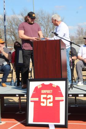 Shawnee Mayor Ed Bolt, right, presents a Key to the City to Kansas City Chiefs Center Creed Humphrey during the Creed Humphrey Day Celebration at Shawnee High School on March 4. Countywide &amp; Sun/Natasha Dunagan