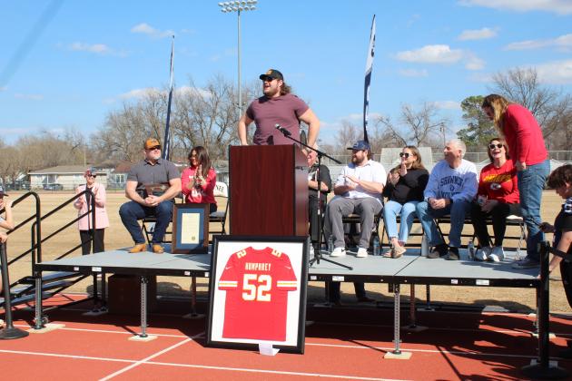 Kansas City Chiefs Center Creed Humphrey speaks at the Creed Humphrey Day Celebration, held at Shawnee High School on March 4. Humphrey recently played in the Super Bowl, and is seen on the stage with his family, CPN Chair John "Rocky" Barrett, Shawnee Mayor Ed Bolt, Avedis President Dr. Kathy Laster, and City Commissioner Travis Flood. Countywide &amp; Sun/Natasha Dunagan
