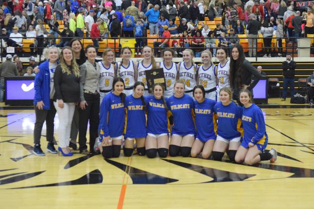 The Bethel Lady Wildcats and their coaches pose with their Class 3A Area Championship plaque after the game against Silo, held at Jenks on March 3. They will play today (March 9) in the State Tournament, 4:30 pm at the State Fairgrounds Arena. Countywide &amp; Sun/Julie Talton