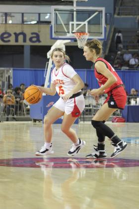 Dale's Kinsley Hill guards the ball and looks for an opening to pass during the last minute of the Class 2A State Championship against Howe on March 11. The Lady Pirates won, 48-23. Countywide &amp; Sun/Natasha Dunagan
