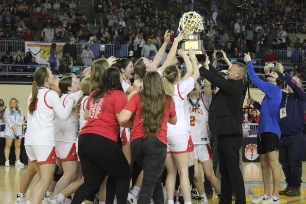 The Dale Lady Pirates cheer as they receive the Class 2A State Championship trophy from Dale Superintendent Will Jones on March 11 at the State Fairgrounds Arena. On the way to this moment, they beat Hooker, 46-21, in the Quarterfinals; Amber-Pocasset, 52-47, in the Semifinals; and Howe, 48-23, in the Finals. Their season record is 31-2. Countywide &amp; Sun/Natasha Dunagan