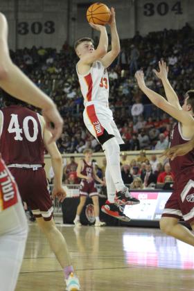 Dale junior Dayton Forsythe rises above the competition to make a jump shot during the third quarter of the Class 2A State Championship game against Oklahoma Christian Academy (OCA) on Sat., March 11. The Dale Pirates won, 78-52. This is their second year in a row to be state champions, and their record is 32-0. Countywide &amp; Sun/Natasha Dunagan