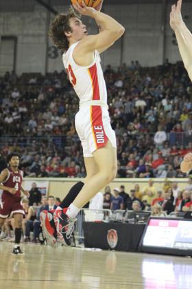 Dale junior Deken Jones aims for the bucket during the third quarter of the Class 2A State Championship game against Oklahoma Christian Academy (OCA) on Sat., March 11. The Dale Pirates won, 78-52. This is their second year in a row to be state champions, and their record is 32-0. Countywide &amp; Sun/Natasha Dunagan