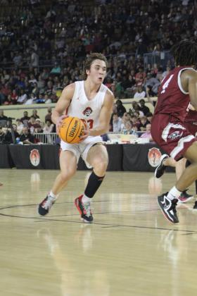 Dale junior Deken Jones drives to the basket during the Class 2A State Championship game against Oklahoma Christian Academy (OCA) on Sat., March 11. The Dale Pirates won, 78-52. This is their second year in a row to be state champions, and their record is 32-0. Countywide &amp; Sun/Natasha Dunagan
