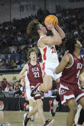 Dale junior Deken Jones makes a jump shot during the second quarter of the Class 2A State Championship game against Oklahoma Christian Academy (OCA) on Sat., March 11. The Dale Pirates won, 78-52. This is their second year in a row to be state champions, and their record is 32-0. Countywide &amp; Sun/Natasha Dunagan