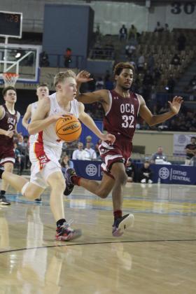 After stealing the ball, Dale freshman Denton Forsythe runs to the hoop in the fourth quarter of the Class 2A State Championship game against Oklahoma Christian Academy (OCA) on Sat., March 11. The Dale Pirates won, 78-52. This is their second year in a row to be state champions, and their record is 32-0. Countywide &amp; Sun/Natasha Dunagan