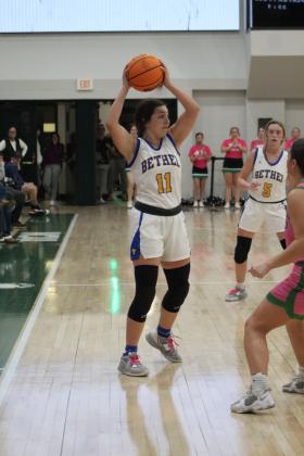 Hannah Davidson looks to pass the ball during a game last month.