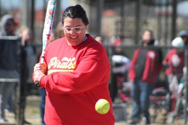Dale Middle School Science Teacher and 2011 graduate Ashley (Sanford) Barbosa passes on a ball during the First Annual Dale High School Alumni Slowpitch Softball Game on March 18. Countywide &amp; Sun/Natasha Dunagan