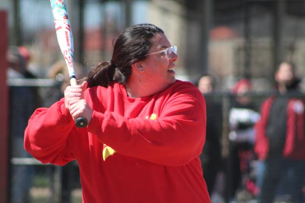 Dale Middle School Science Teacher and 2011 graduate Ashley (Sanford) Barbosa passes on a ball during the First Annual Dale High School Alumni Slowpitch Softball Game on March 18. Countywide &amp; Sun/Natasha Dunagan