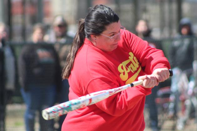Dale Middle School Science Teacher and 2011 graduate Ashley (Sanford) Barbosa passes on a ball during the First Annual Dale High School Alumni Slowpitch Softball Game on March 18. Countywide &amp; Sun/Natasha Dunagan