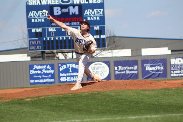 Shawnee senior Easton Odell hurls one over home plate during the first inning of the first home game of the season, March 4. The Wolves beat Del City, 8-0. It was also the first game played with their new electronic scoreboard, sponsored by Arvest Bank, and four associates from Arvest threw out the first pitch(es). Countywide &amp; Sun/Natasha Dunagan
