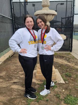 Tecumseh's Karsyn McDonald and Kayley Wood pose after placing second in 2 Doubles at the Pauls Valley Tennis Tournament at Westwood on March 7. Photo provided