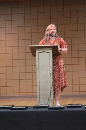 Tecumseh Chamber of Commerce Executive Director Kim Elliott speaks at the Teacher's Luncheon.