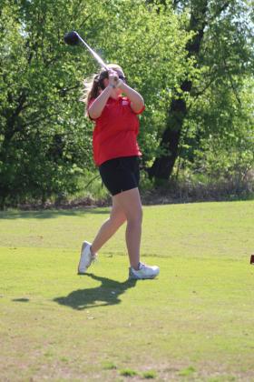 North Rock Creek junior Abi Hurst drives to the next hole during the Tecumseh Girls Golf Invitational at FireLake Golf Course on April 18. Hurst scored a 91 at the tournament. Countywide &amp; Sun/Natasha Dunagan