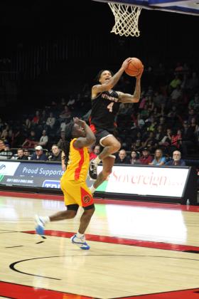 Potawatomi Fire Guard Chuck Guy slams in two points during the second quarter of the home game with the Shreveport Mavericks, March 31. The Fire won, 131-106. Countywide &amp; Sun/Natasha Dunagan