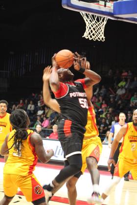 Potawatomi Fire Forward and Center Paul Harrison tries for a basket and gets fouled in the second quarter of the home game with the Shreveport Mavericks, March 31. The Fire won, 131-106. Countywide &amp; Sun/Natasha Dunagan