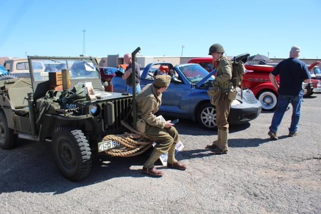 Dressed in WWII uniforms, Jack Osvatic and Riley Brull with the 45th Infantry Living Historians and Reenactors, out of OKC, give life to a 1942 Jeep during the 7th Annual Bethel Band Boosters Car Show on April 8. The Jeep, owned by Jason Nadle, won the Special Interest category. Countywide &amp; Sun/Natasha Dunagan