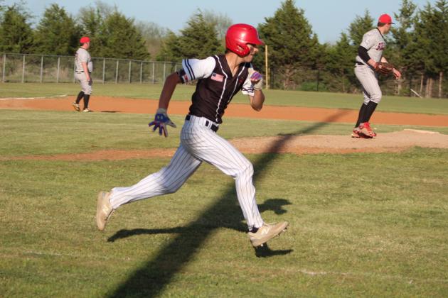 Earlsboro junior Trystan Black runs to first in the game against Stratford on April 17. The Wildcats won, 12-9. Countywide &amp; Sun/Natasha Dunagan