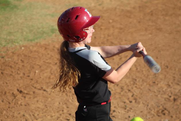Earlsboro's Elizabeth Kilby hits a single in the home game with Paden on April 17. Countywide &amp; Sun/Natasha Dunagan