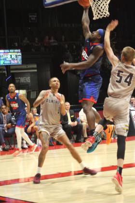 Potawatomi Fire Guard/Forward K.D. Moore puts up two more points on the scoreboard during the home game with the Oklahoma Panthers on April 13. The Fire won, 128-90. Countywide &amp; Sun/Natasha Dunagan