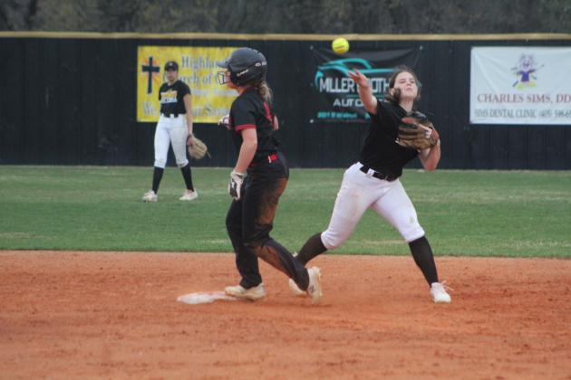Tecumseh second baseman Katie Overstreet throws to first during the Lady Savages' second home game of the evening, April 4. They won that game against Westmoore, 15-5, and with Latta, 6-4. Countywide &amp; Sun/Natasha Dunagan