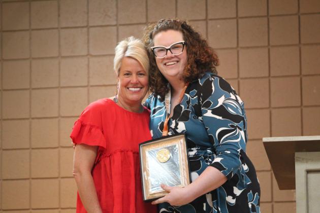 Cross Timbers Principal Alisha Jonker, right, presents the Lola C. Durham Award to Cody Swinson.