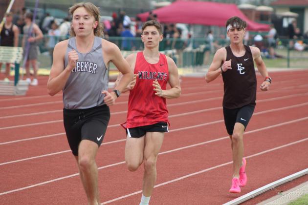 Earlsboro runner Andrew Moore-Holland, center, competes during the OBU Invite on April 4. Countywide &amp; Sun/Natasha Dunagan