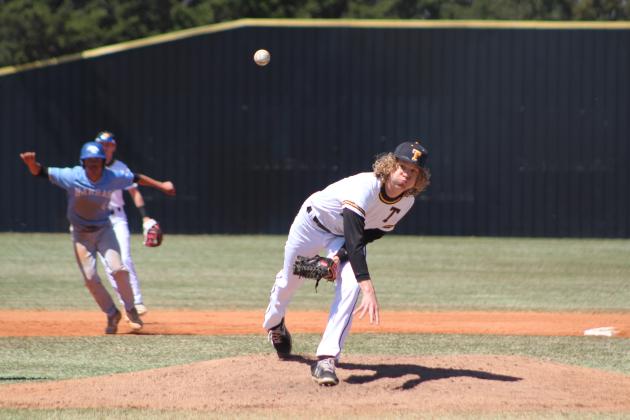 Tecumseh sophomore Zachary Walker hurls the ball toward home, as a Harrah player tries to steal third during the second inning of the home game on April 1. Countywide &amp; Sun/Natasha Dunagan