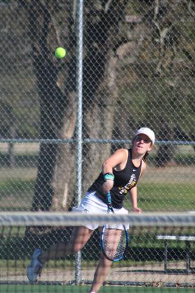Tecumseh's Laycee Thoma sends the ball back, as part of the #2 Doubles team with Karsyn McDonald, during the Tecumseh Tennis Tournament on April 3. Tecumseh High School hosted seven schools, and Thoma and McDonald placed fourth. Countywide &amp; Sun/Natasha Dunagan