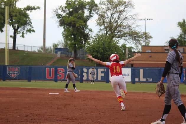Dale freshman Daley Lang flies to second base and beyond after hitting a home run in the fourth inning of the Class 3A State Tournament Finals against Caddo on May 3. On the same day, the Lady Pirates beat Haskell, 11-4, and Tushka, 13-2, at the USA Softball Hall of Fame Stadium. They were named Class 3A Runners-Up after falling in the finals, 8-13. Countywide &amp; Sun/Natasha Dunagan