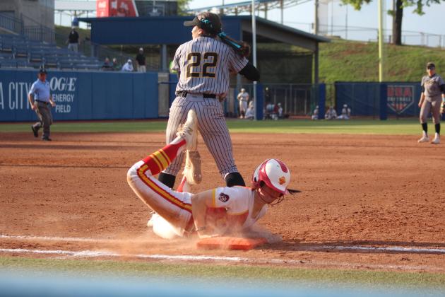Dale junior Karsen Griggs slides into first base with a rough landing in the seventh and final inning of the Class 3A State Tournament Finals against Caddo on May 3. On the same day, the Lady Pirates beat Haskell, 11-4, and Tushka, 13-2, at the USA Softball Hall of Fame Stadium. They were named Class 3A Runners-Up after falling in the finals, 8-13. Countywide &amp; Sun/Natasha Dunagan