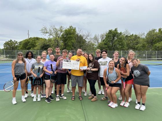 The Tecumseh High School Tennis Team and THS Student Council both raised money to donate to the Boys and Girls Club of Tecumseh and Shawnee. Shown here are members of the tennis team and student council with Julio Sanchez representing the Boys and Girls Club. Photo provided.