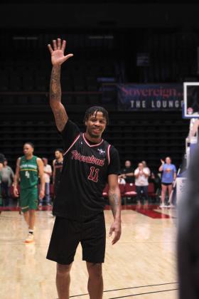 Potawatomi Fire Forward Ruston Hayward waves to the fans after a referees' decision that he was fouled in the fourth quarter on June 19. The Fire came from behind to win the TBL Central Conference Regionals against the Seattle Super Hawks, 124-114. Countywide &amp; Sun/Natasha Dunagan