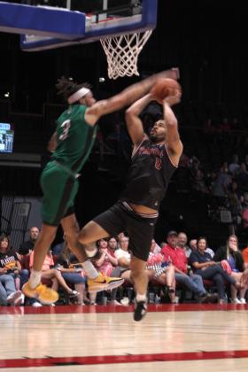 Potawatomi Fire Guard Deshawn Munson adds another two points to the bucket in the second quarter on June 19 at FireLake Arena. The Fire came from behind to win the TBL Central Conference Regionals against the Seattle Super Hawks, 124-114. They will go on to play in the TBL Finals against the St. Louis Griffins, with the games dates announced on potawatomifire.com. Countywide &amp; Sun/Natasha Dunagan