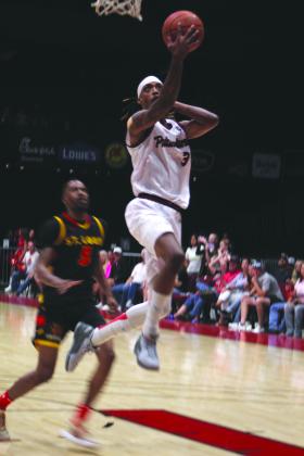 Potawatomi Fire Guard/Forward Ricky Artis II takes the ball to the hoop after a steal in the third quarter of the second game during the TBL Finals with the St. Louis Griffins at FireLake Arena on June 26. They won 127-95 to force the third game on June 27. Countywide &amp; Sun/Natasha Dunagan