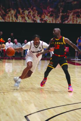 Potawatomi Fire Forward Ruston Hayward takes the ball down the court in the second game of the TBL Finals with the St. Louis Griffins at FireLake Arena on June 26. They won 127-95 to force the third game on June 27. Countywide &amp; Sun/Natasha Dunagan