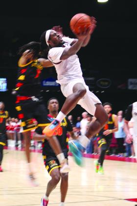 Potawatomi Fire Guard/Forward K.D. Moore aims for the hoop in the fourth quarter of the TBL Championship on June 27 at FireLake Arena. In their third game with the St. Louis Griffins, the Fire won their first national title, 98-89, in just their second season. Countywide &amp; Sun/Natasha Dunagan