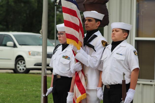 U.S. Naval Sea Cadets Diana Murray, Ammar Hammody and Riley Creekpaum serve as Color Guard during the Memorial Day service at Tecumseh Cemetery on May 29. The Sea Cadets and Trainingship Oklahoma members are sponsored by American Legion Post 260 in Tecumseh. Countywide &amp; Sun/Natasha Dunagan