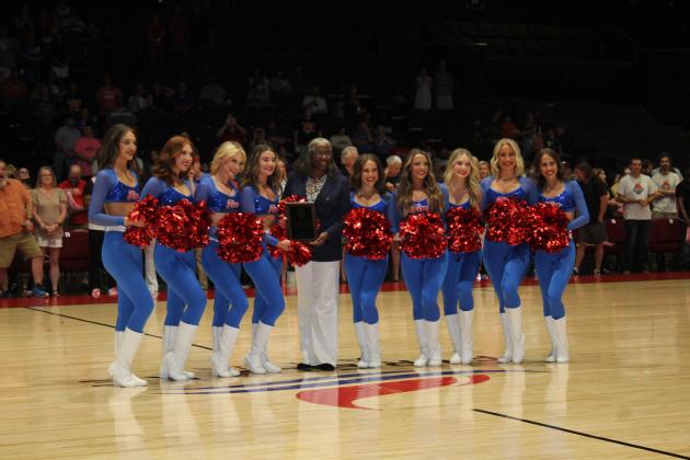 The Basketball League CEO Evelyn Magley presents the Central Conference Best Dance Team award to the Fire Girls of the Potawatomi Fire on June 19 before the second Regional game. Countywide &amp; Sun/Natasha Dunagan